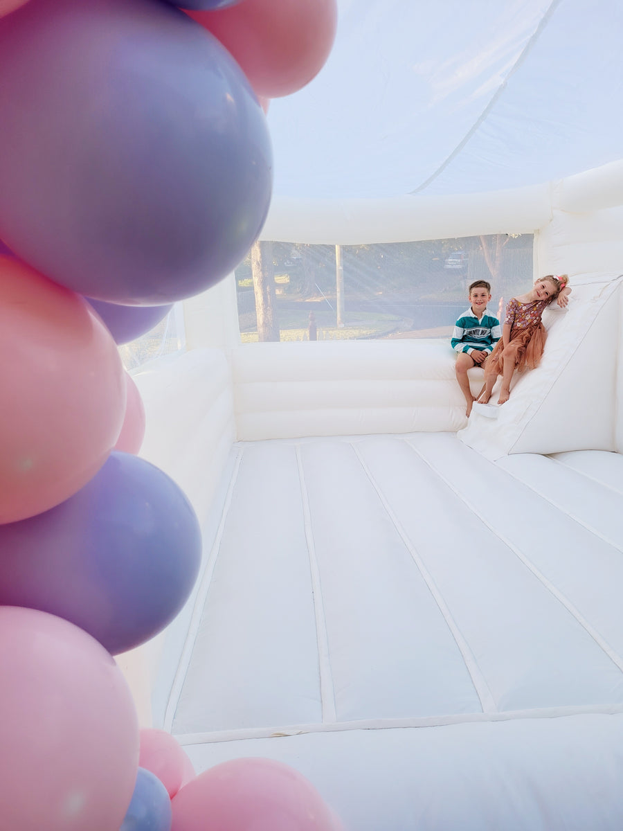 ‘William' The White Bouncy Castle with Slide